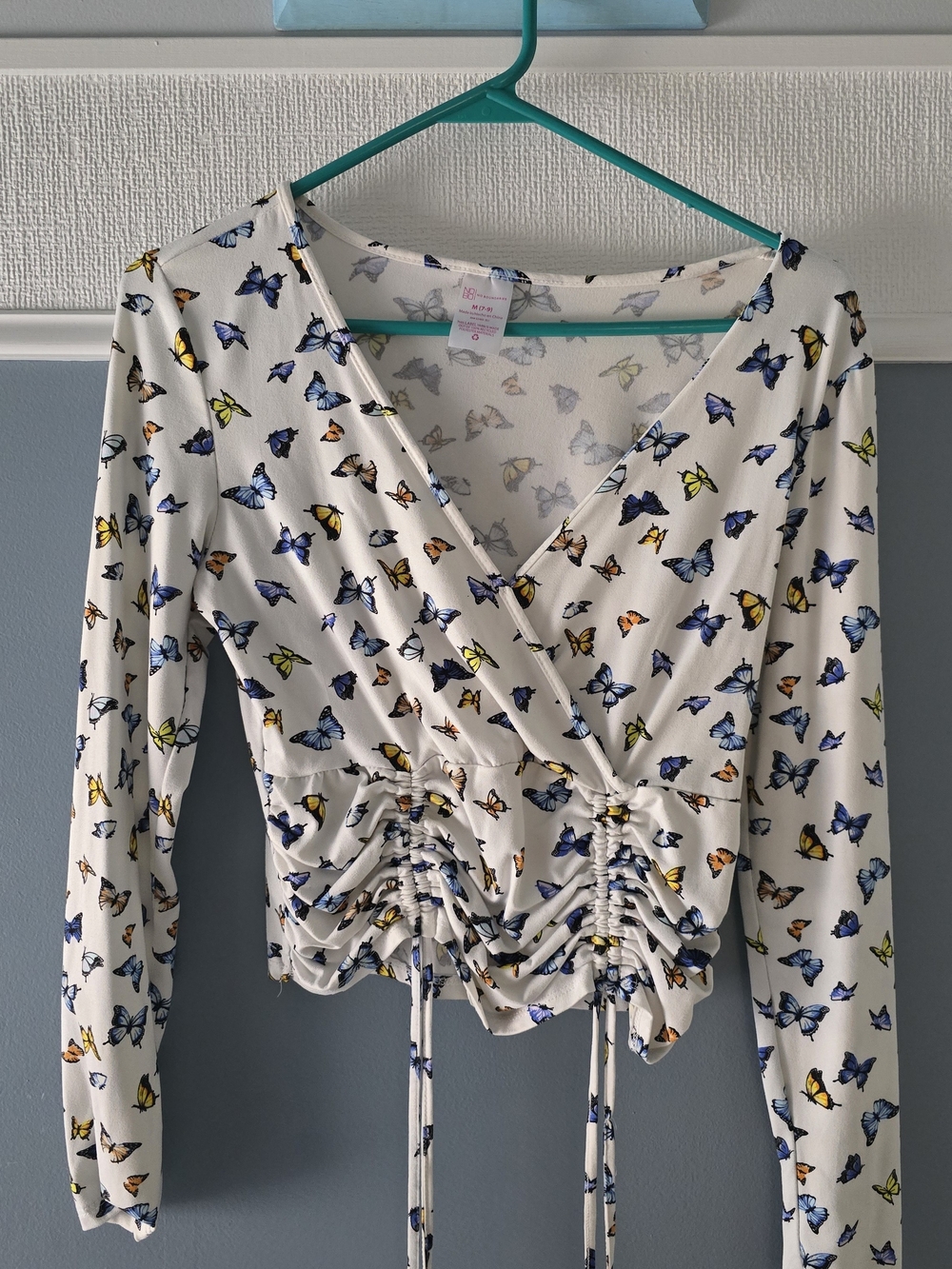 No Boundaries White Butterfly Print Wrap Crop Top